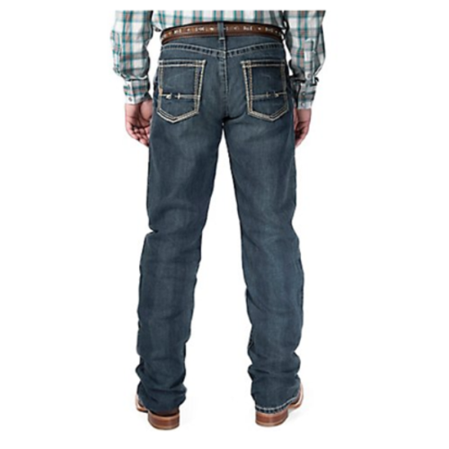 The back of a man wearing Men's Ariat M4 Boundary Gulch Jeans 10012136 and a plaid shirt.