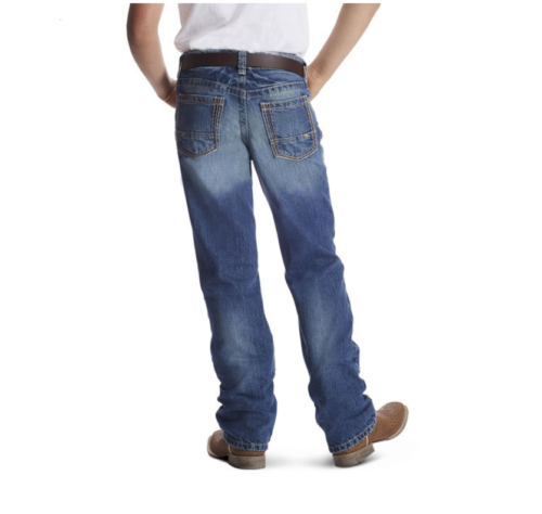 A boy wearing a pair of Ariat Boys Jean Relaxed Boot Cut B4 Boundary jeans and a cowboy hat.