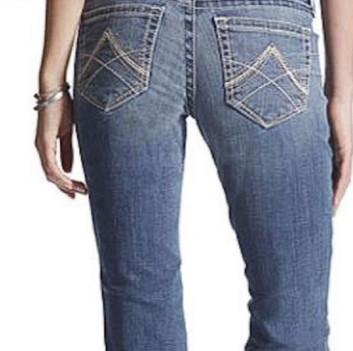 The back view of a woman wearing a pair of Ladies Ariat Jean Straight Leg 10017217.