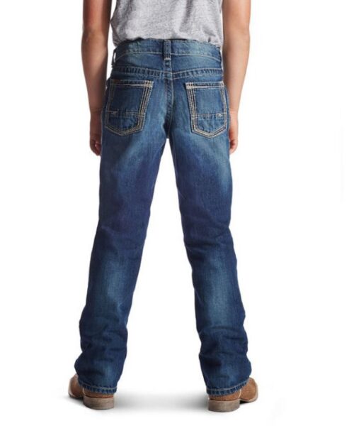 The back view of a boy wearing a pair of Boys Western Jean Ariat B5 Slim Fit Boundary Cyclone 10018338 jeans.