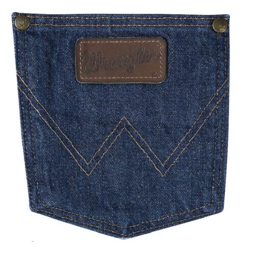 A denim pocket with a leather label on it, featuring the Men's Wrangler Performance Regular Fit Cowboy Cut 47MWZPW branding.