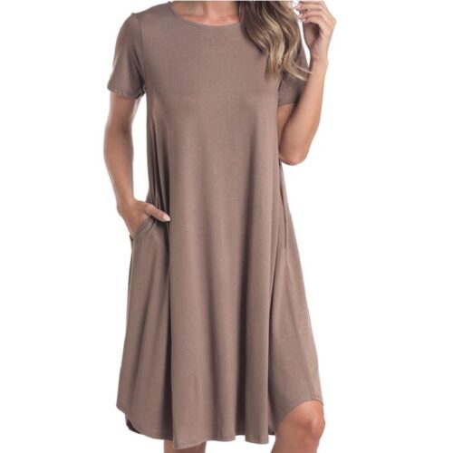 A woman wearing the Women's Panhandle SS Olive Dress.