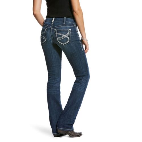 A woman wearing jeans and a back view.