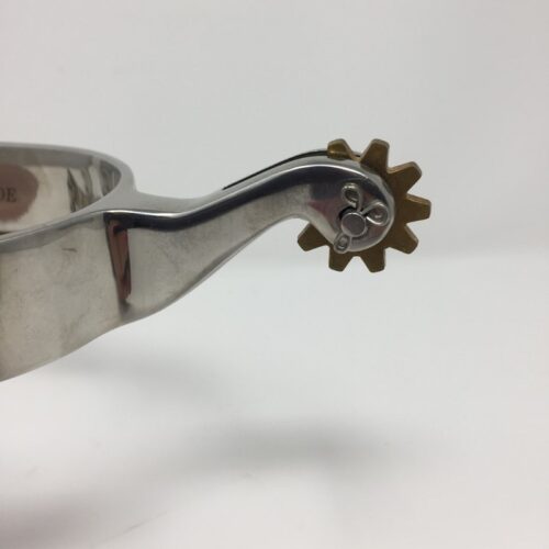 A men's stainless steel roping spur 258820 with a gear on it.