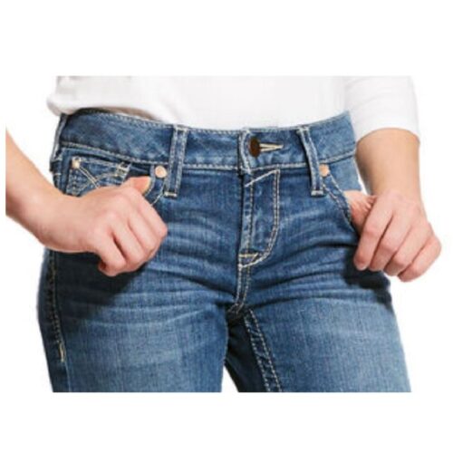 Girls Real Boot Cut Whipstitch Jean 10025985 with hands in pockets.