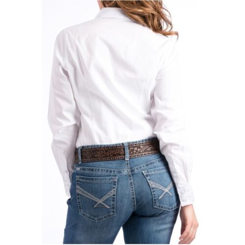 The back view of a woman wearing jeans and a white shirt from the Ladies Classic White Button Up Shirt MSW9164026 collection.