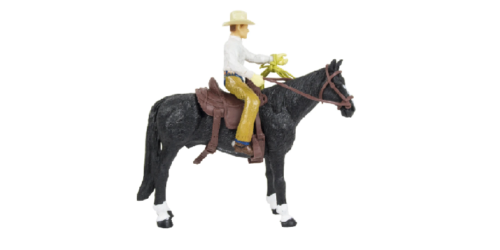 A figurine of a cowboy riding a horse from the Big Country Toy Ranch Set.