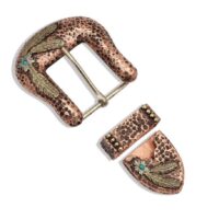 A pair of Montana Silver Along the Desert Buckle Set 62000 belt buckles with turquoise stones.