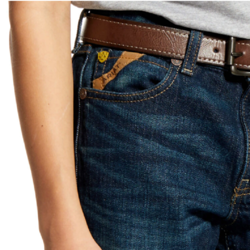 The man is wearing Boy's Ariat Jeans B5 Slim Fit Stretch 10023450 with a brown belt.