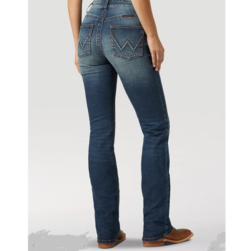 The back view of a woman wearing a pair of Ladies Wrangler Riding Jean Willow.