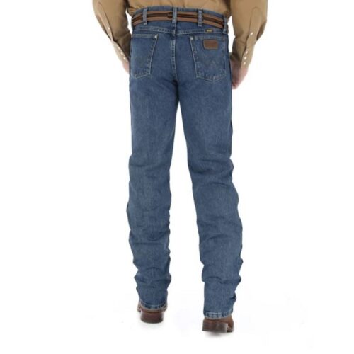 The back of a man wearing Men's Jean Wrangler Performance Regular Fit Cowboy Cut 47MWZDS jeans and a cowboy hat.