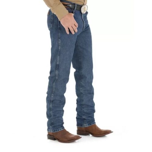 A man wearing the Men's Jean Wrangler Performance Regular Fit Cowboy Cut 47MWZDS.