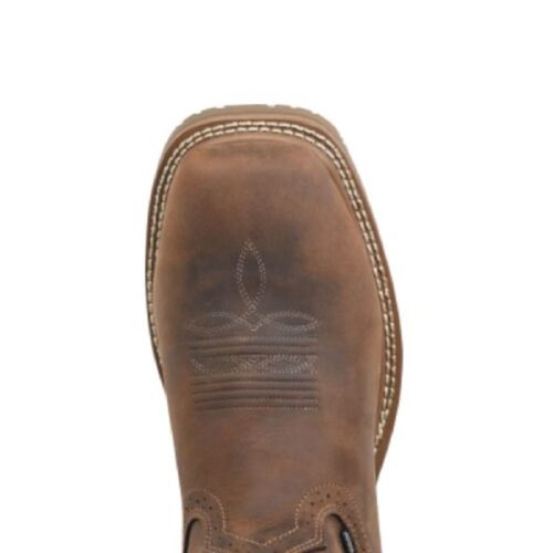 A pair of brown cowboy boots on a white background showcasing the Men's Carolina Anchor Work Boot CA8036.