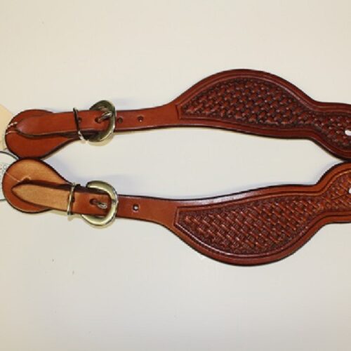 A pair of brown leather Billy Cook Basketweave Spur Straps on a white surface.