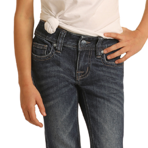 A young girl wearing the Girl's Rock n Roll Trouser Jean and a white t-shirt.