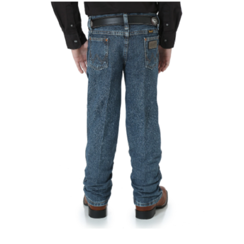 The back view of a boy wearing Boy's Wrangler Original Cowboy Cut Jeans.