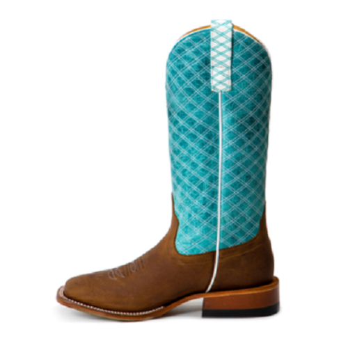 The [Macie Bean Tex Marks the Spot Ladies Boot] is a stunning women's cowboy boot featuring turquoise and brown accents.