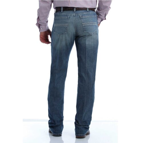 A man's back showcasing a pair of Cinch Men's Silver Label Arena Flex Jean MB98034015 with Arena Flex technology.