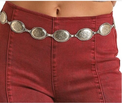 A Rock n Roll lady rocking Rock n Roll Wine Bell Ladies Jeans with a silver belt.