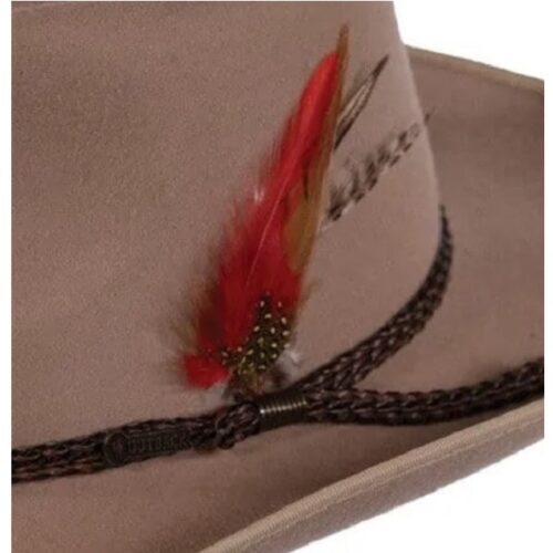 An Outback Dove Creek Fashion Hat with a red feather on it.