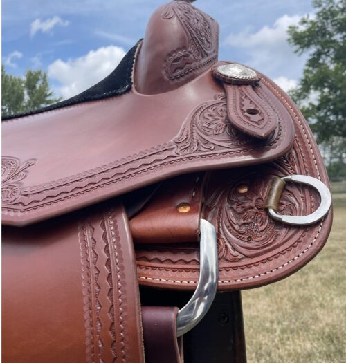 A close up of a Bob Avila 16.5" Reining Saddle.