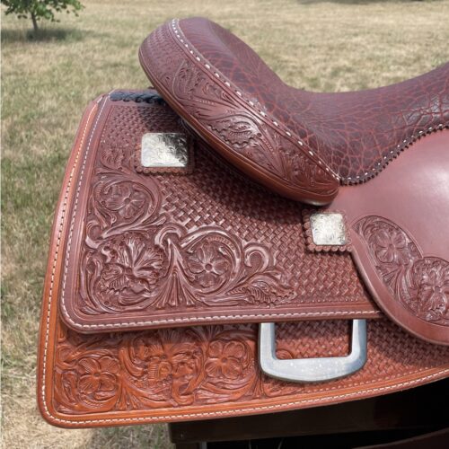 Bob's Lady Reiner 16" Saddle with an intricate design.