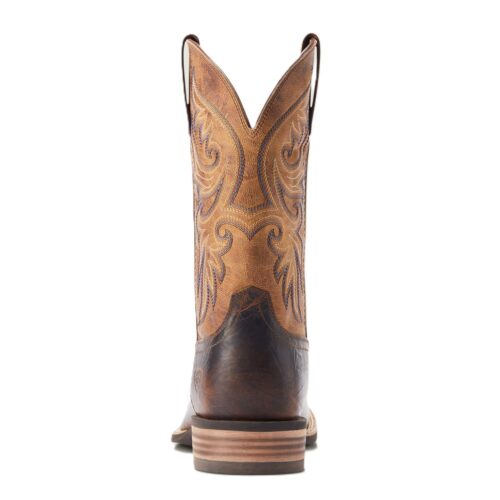 Brown leather cowboy boots with stitching.