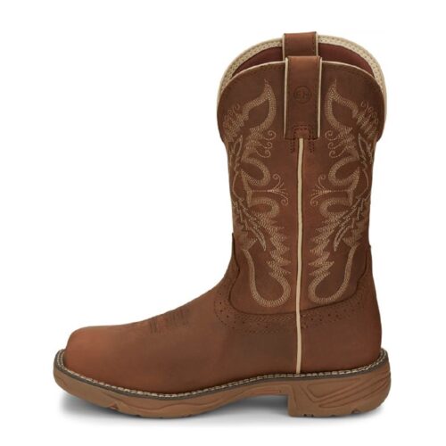 Brown leather cowboy boots with embroidery.